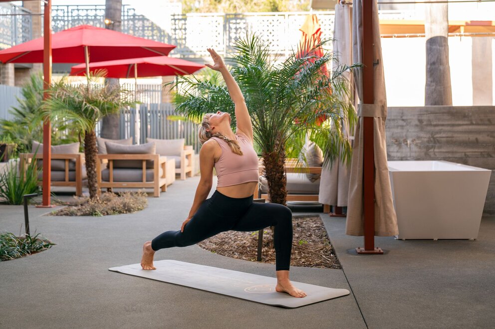 woman doing warrior pose