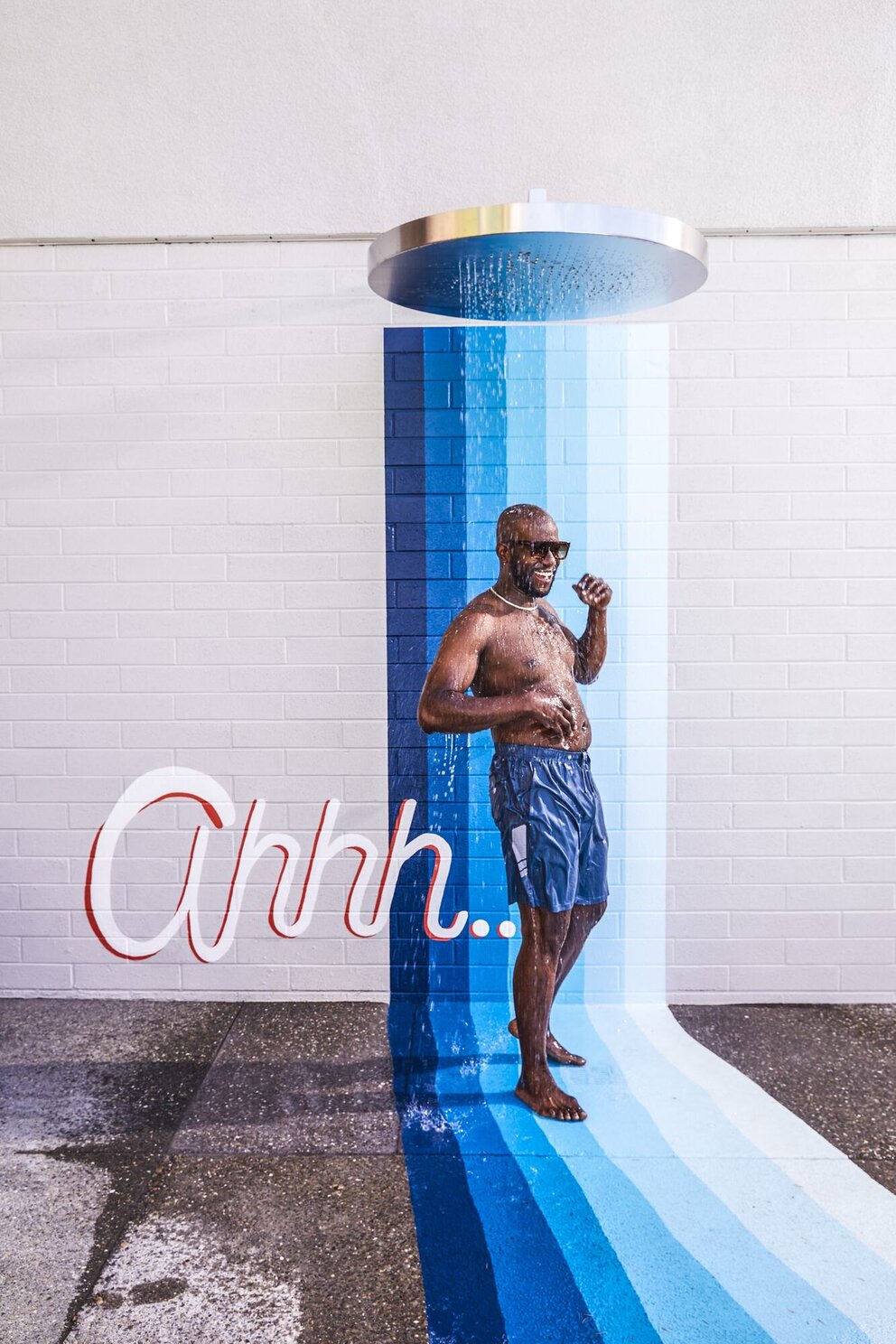 person in outdoor shower